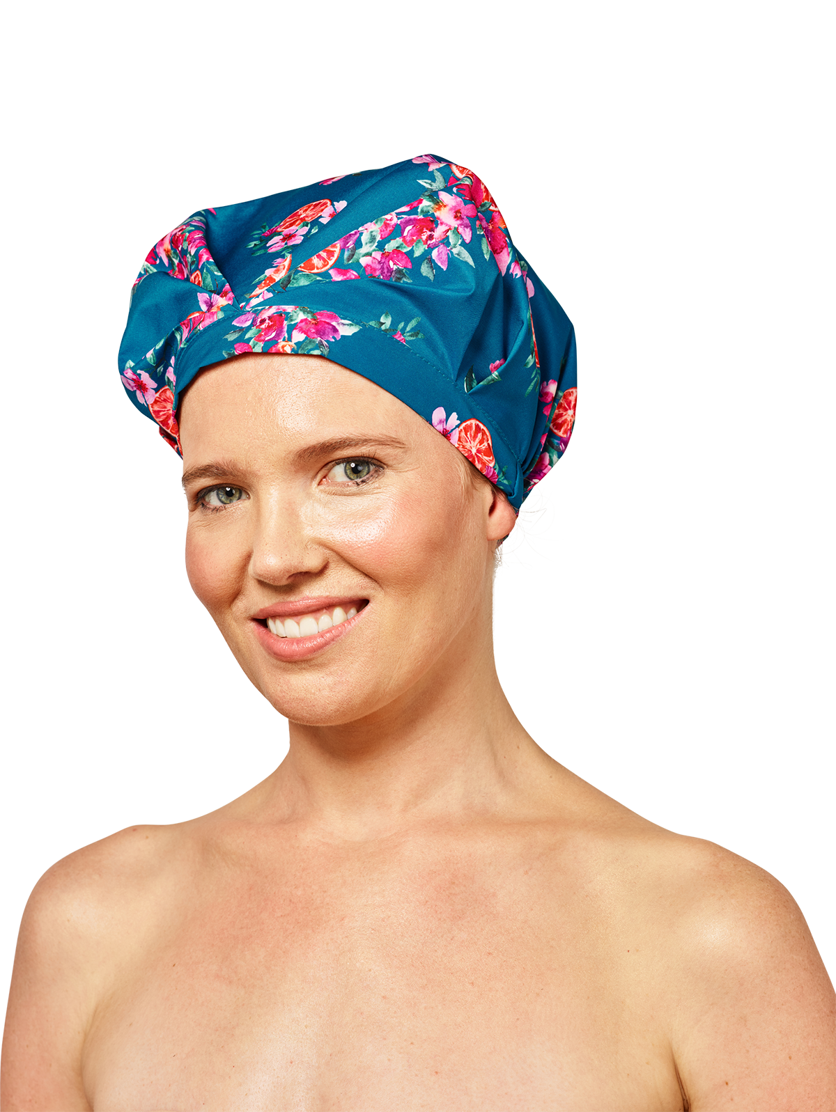 woman wearing blue musae mane shower cap in floral amalfi print on a white background