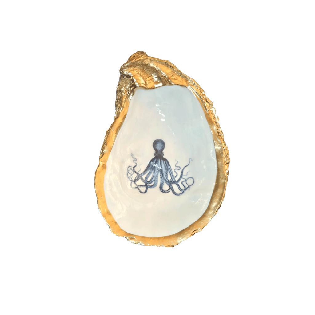 Decorative shell with an octopus design on a white background