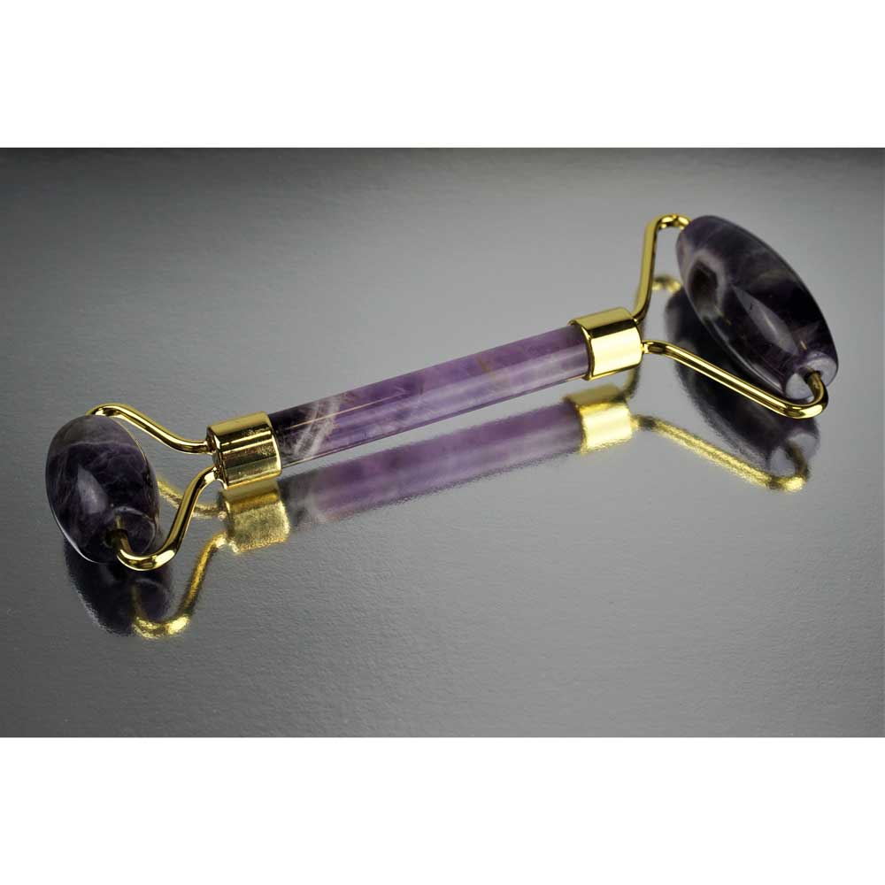 amethyst crystal facial roller reflection