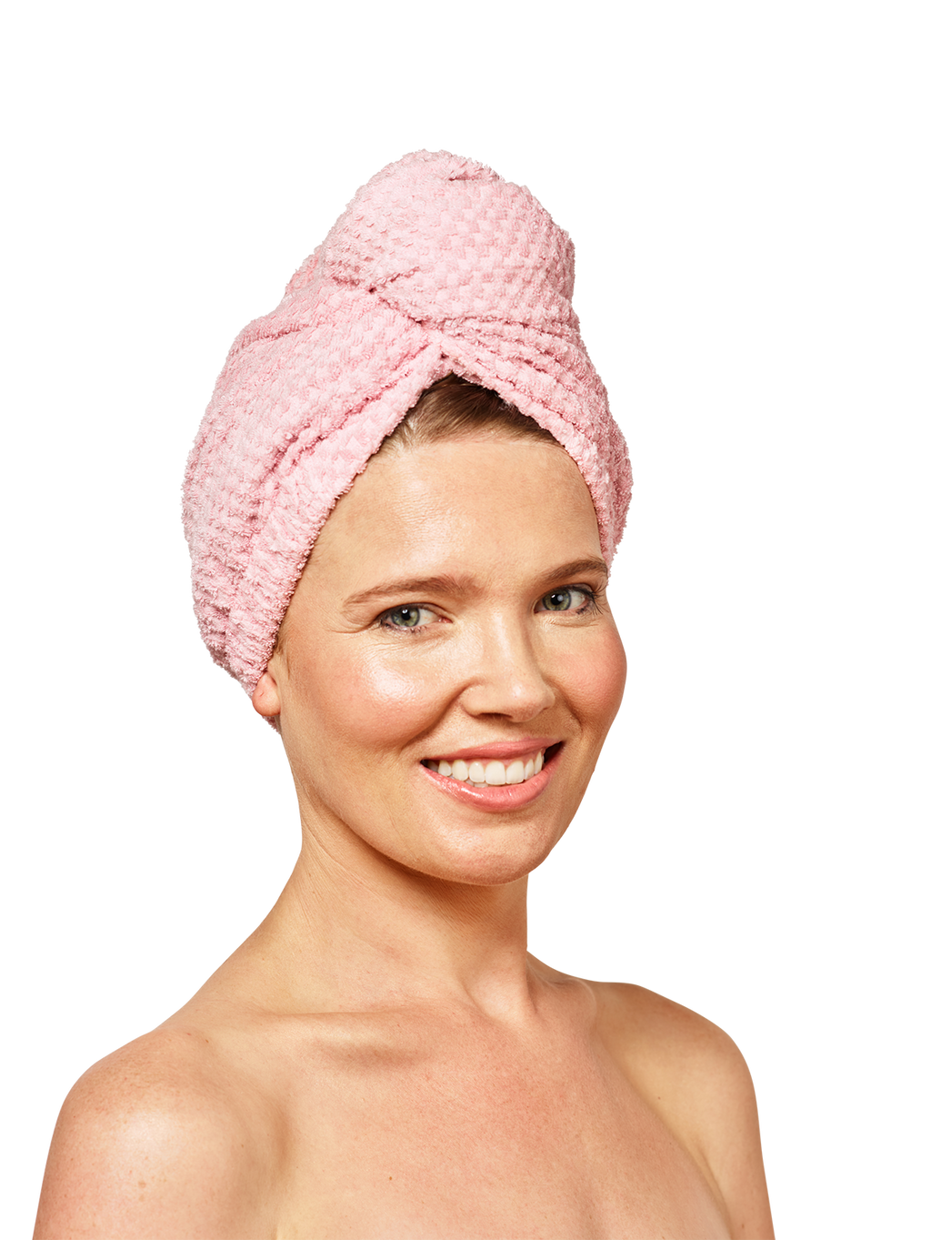 Woman wearing Musae Mane hair towel in pink parfait on a white background. 