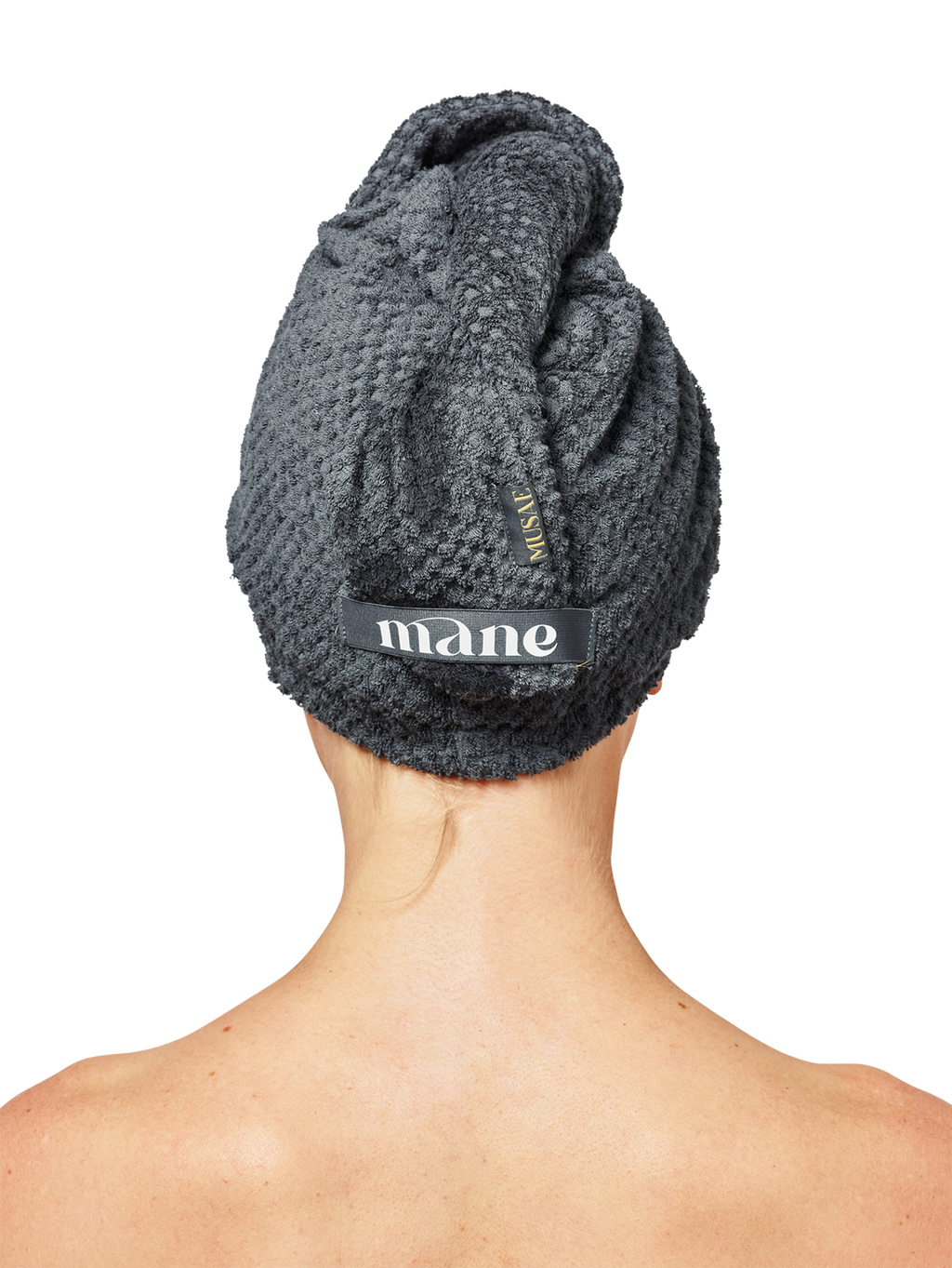 Back of a persons head with a Musae mane hair towel wrap in Stormy Weather grey on a white background