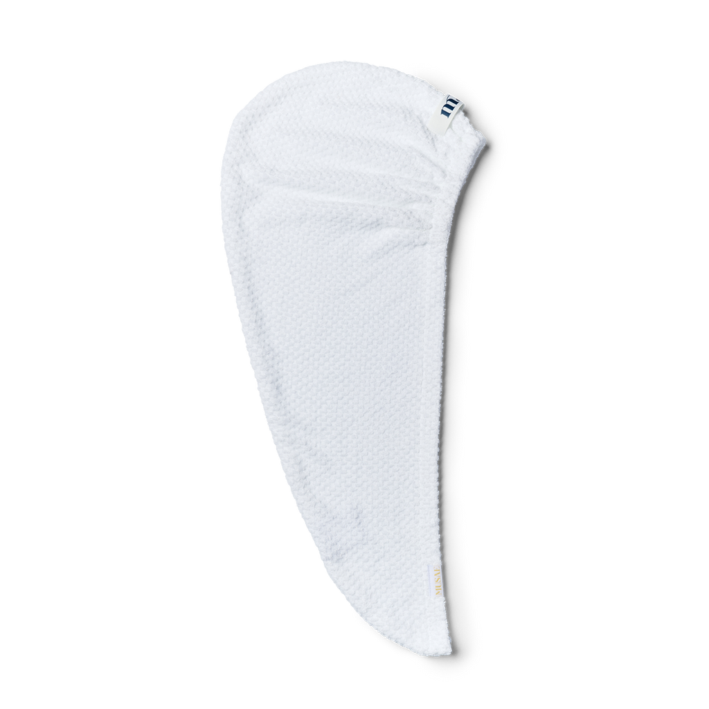 musae mane hair towel in pure white laying flat lay on a white background