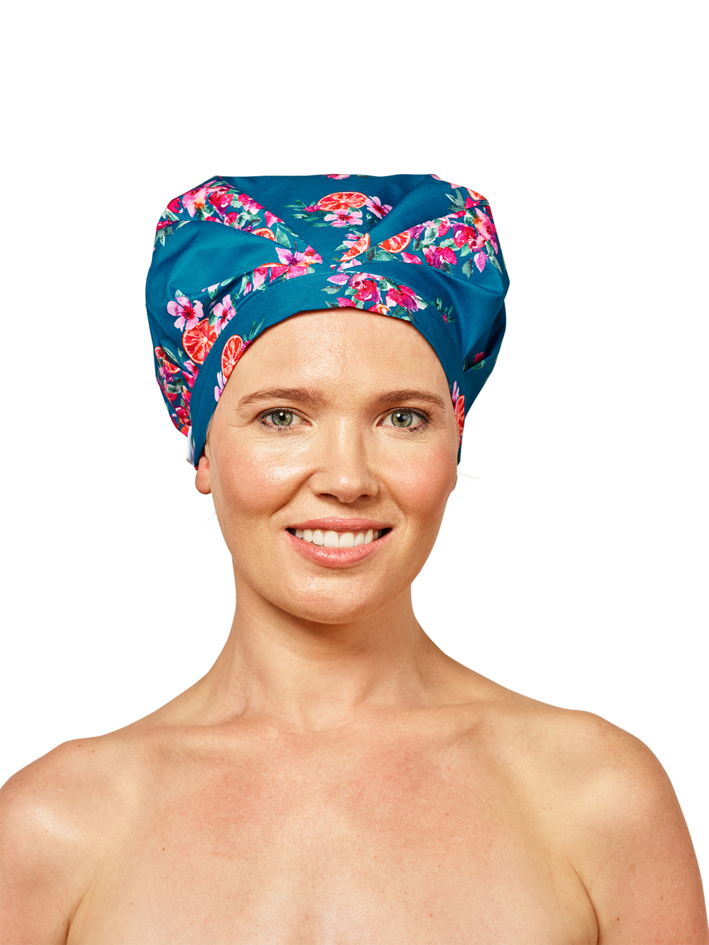 woman wearing blue musae mane shower cap in floral amalfi print on a white background