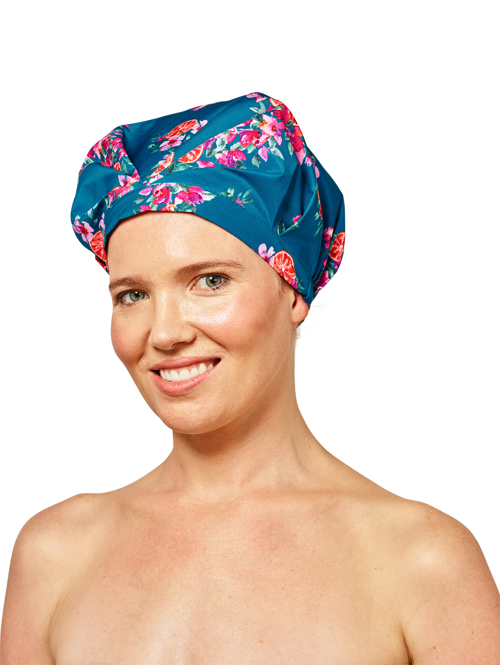 woman wearing blue musae mane shower cap in floral amalfi print on a white background