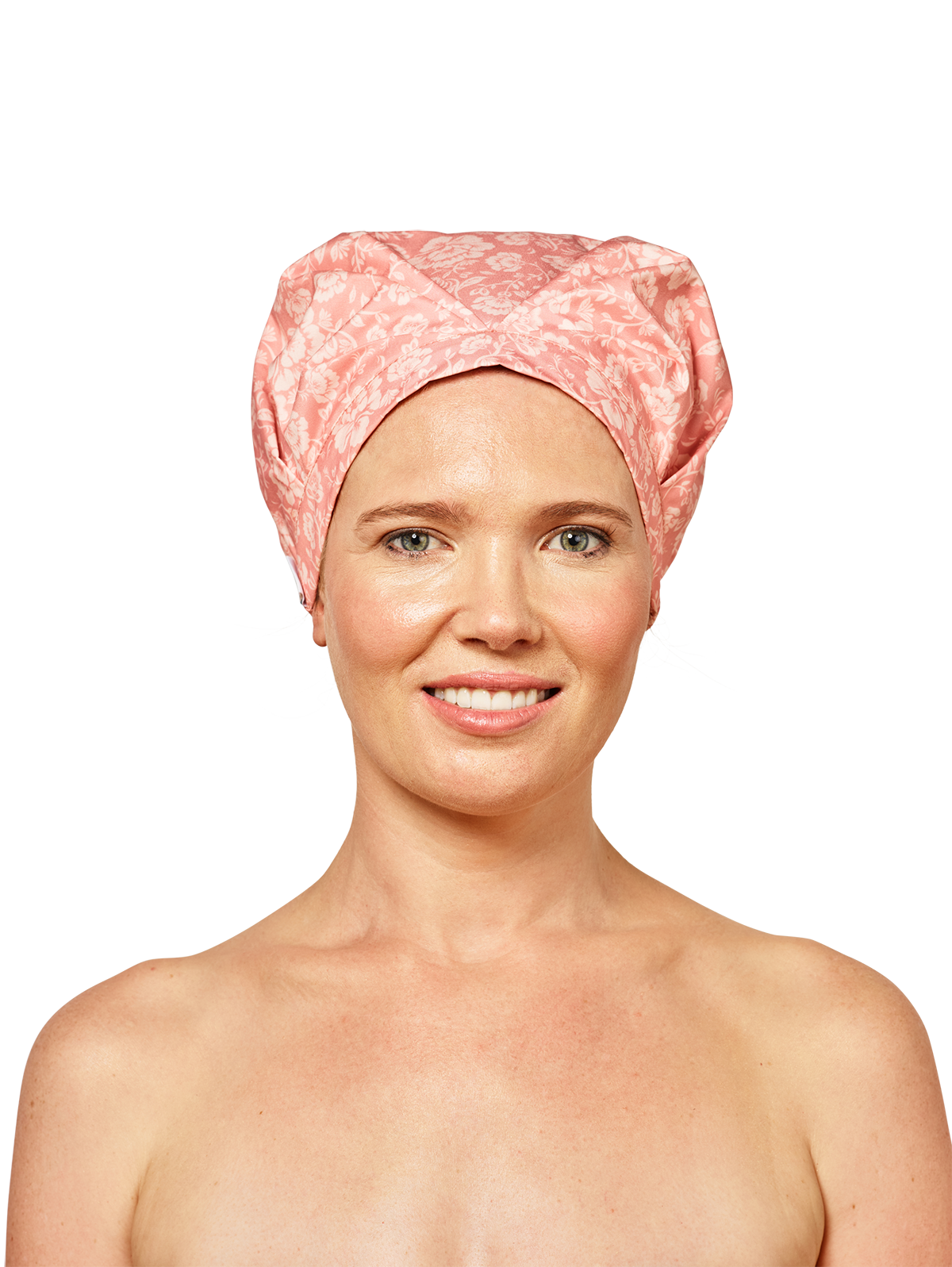 woman wearing musae mane shower cap in pink blossom print on a white background