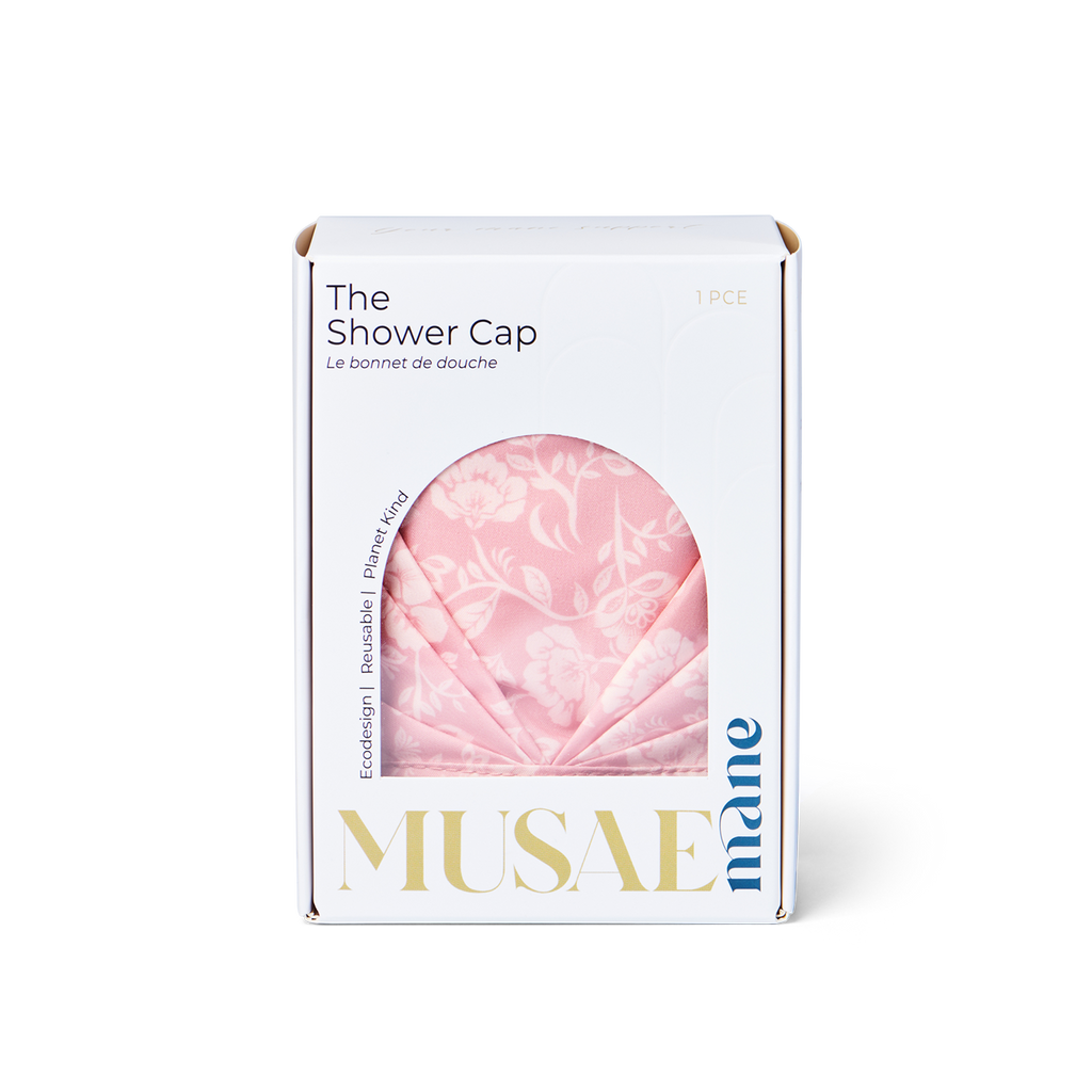 musae mane shower cap blossom print in its bo on a white background