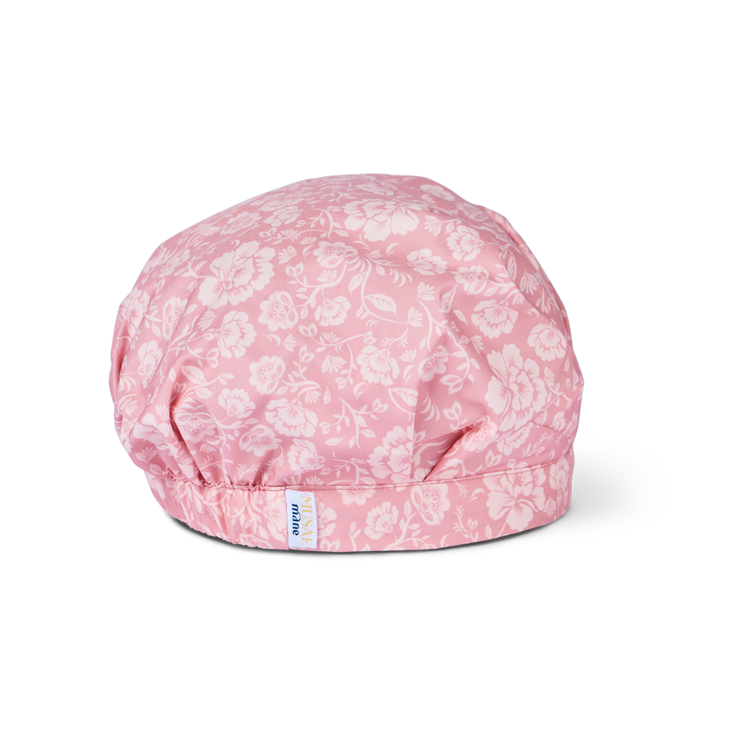 musae mane shower cap in blossom print side view on a white background