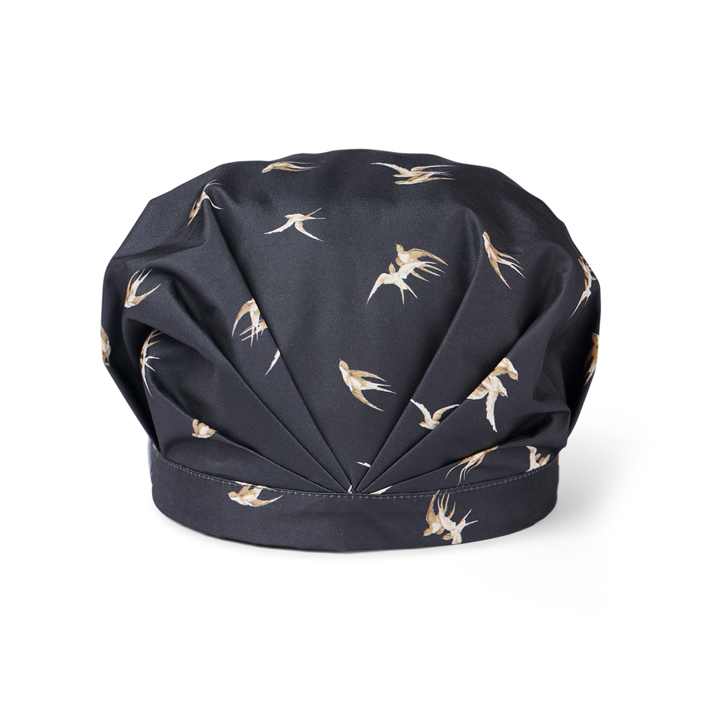 Musae mane shower cap in songbird- a  bird pattern on a black background