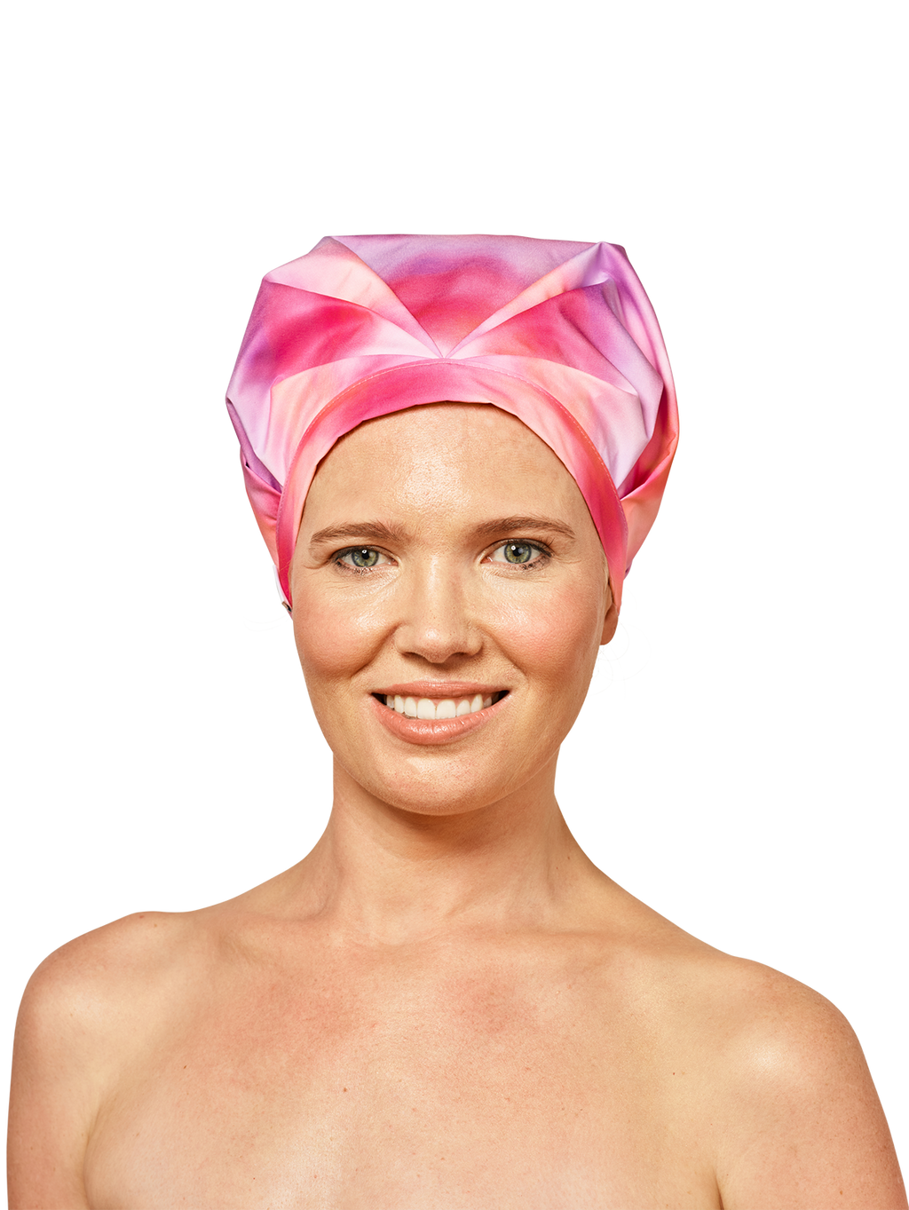 female model wearing musae mane shower cap in pink sunset print on a white background