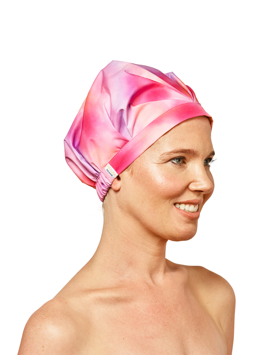 model looking to the right wearing musae mane shower cap in sunset print on a white background