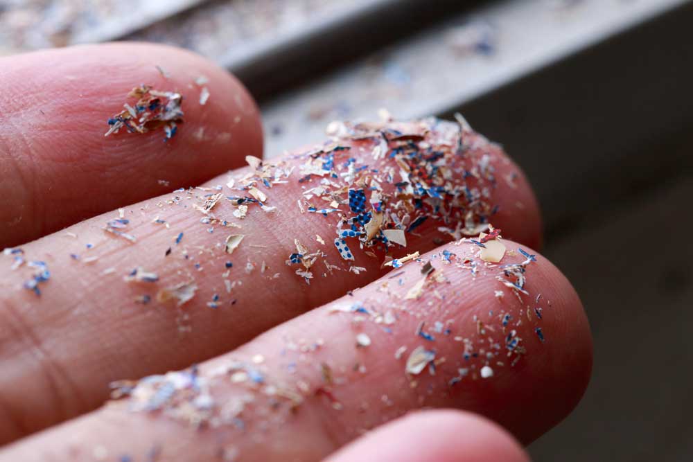 ocean microplastics in a persons hand